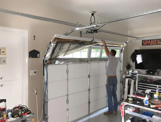 Garage door section replacement by Willoughby Garage Door Repair in Willoughby