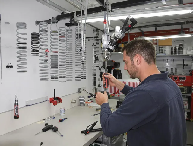 Willoughby Garage Door Repair safety certified technician performing precision spring replacement in Willoughby